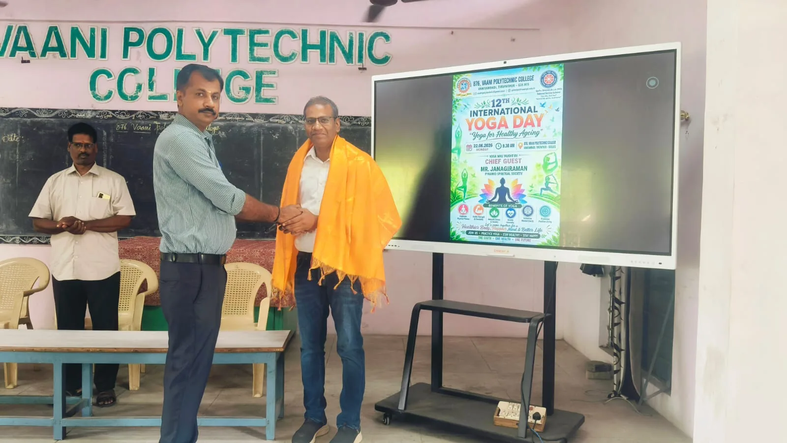 Felicitation moment on stage at Vaani Polytechnic College during International Yoga Day 2026